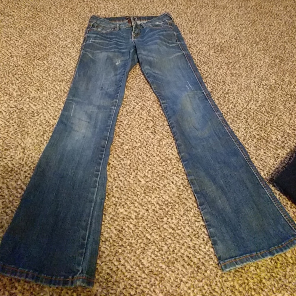 Dark distressed jeans